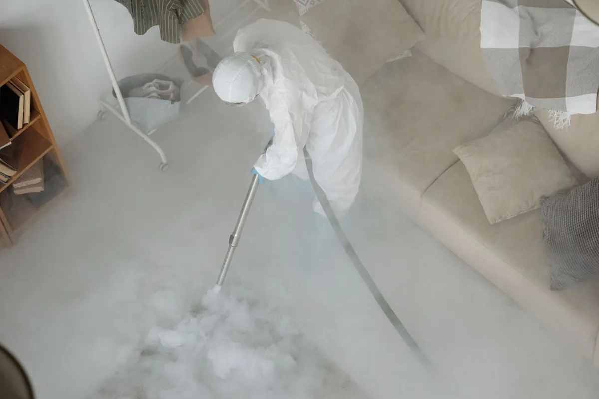 Biohazard cleanup technician in protective equipment, Mountain Green, UT